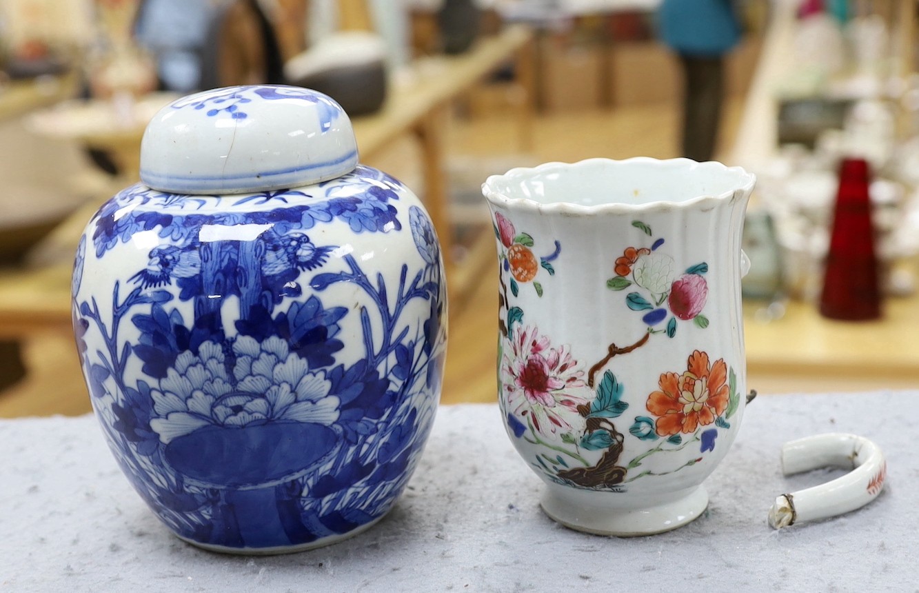 A Chinese blue and white jar and cover, Kangxi mark late 19th century and an 18th century Chinese famille rose mug. 15.5cm high